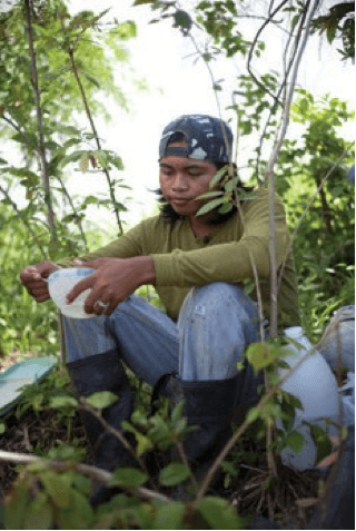 Asian man eating outside