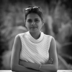 Black and white headshot of Roli Srivastava. 