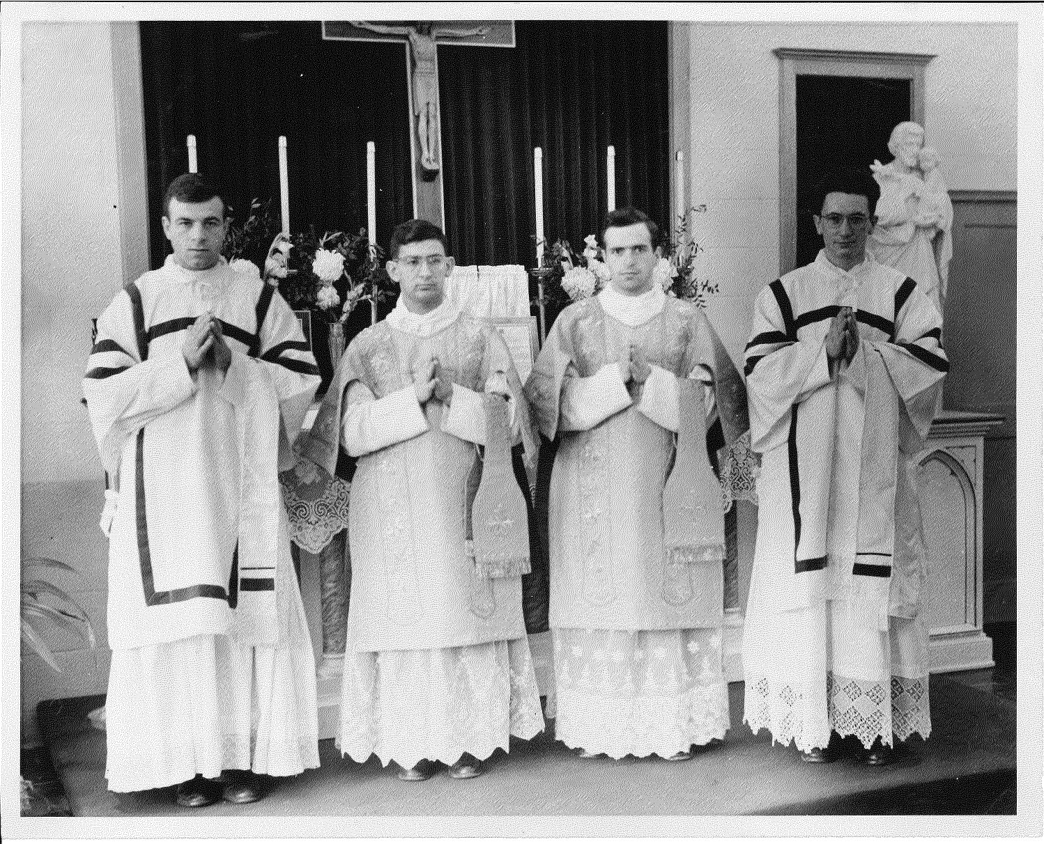 Black and White photo with catholic acolytes holding candles