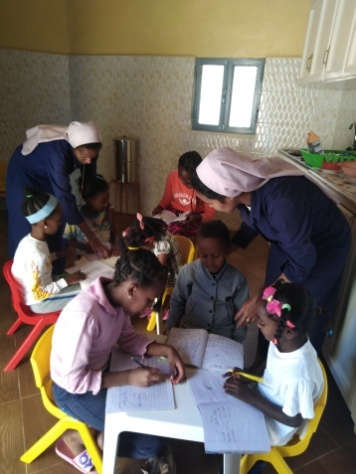 Good Samaritan Sisters teach orphans in their family-like homes