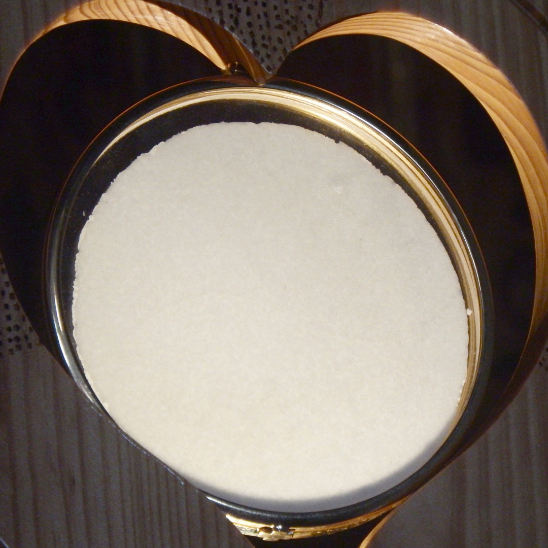 A Eucharist host inside a heart-shaped monstrance