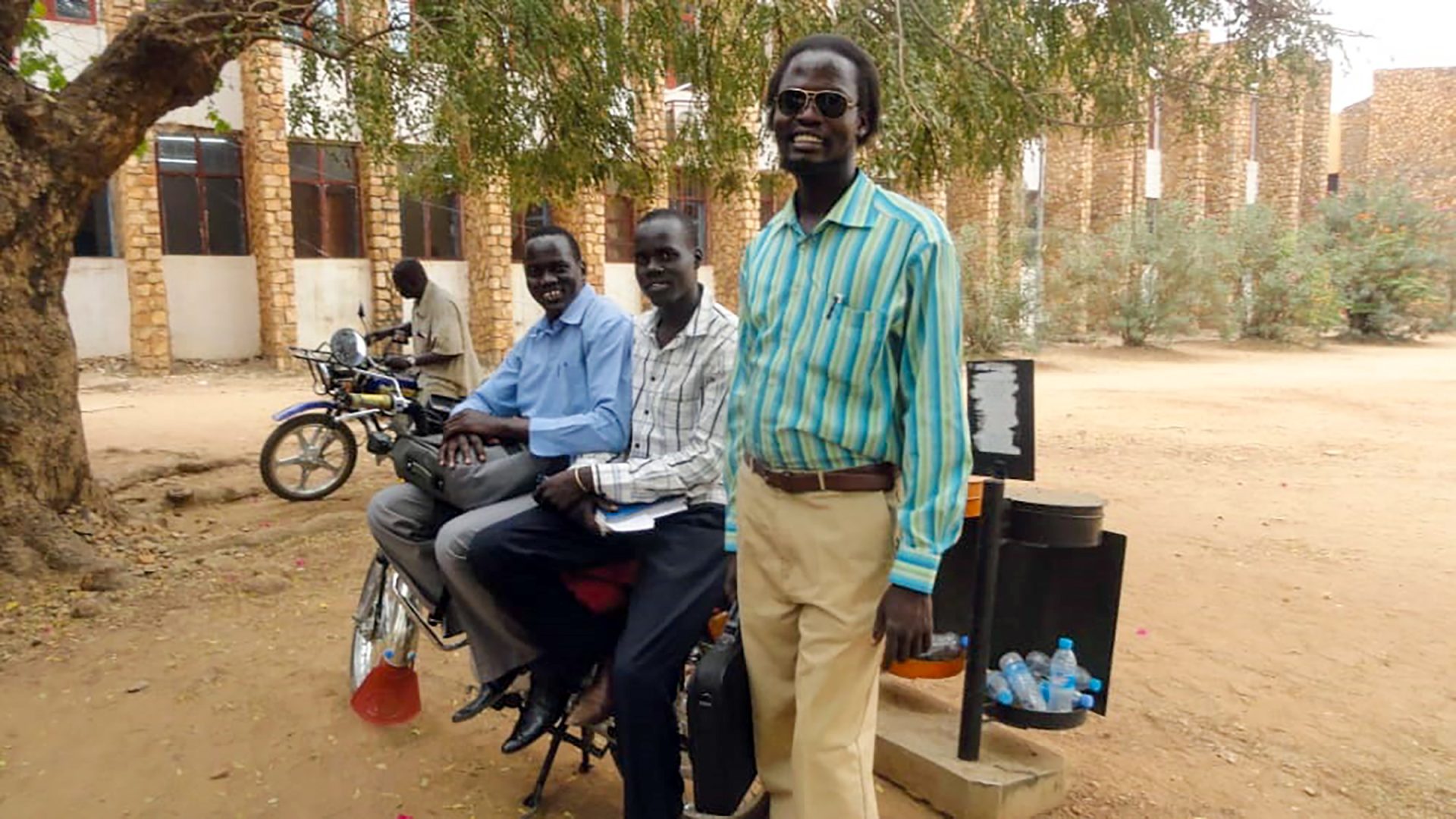 Simon Yomkuey at the University of Juba, in 2009, with two of his companions