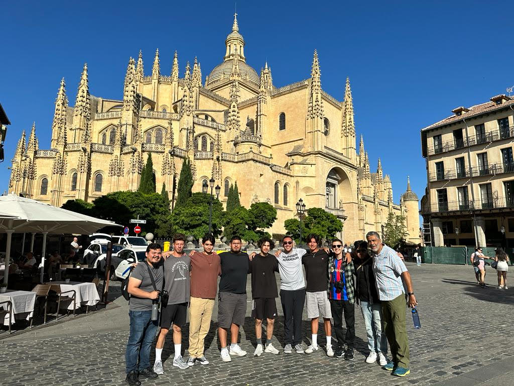Missionary Souls group poses in front of a cathedral in portugul