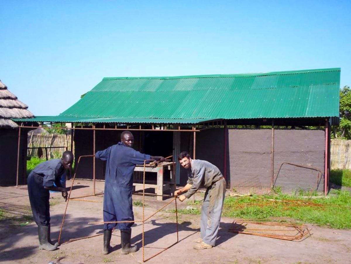 Brother Alberto assists with a construction project