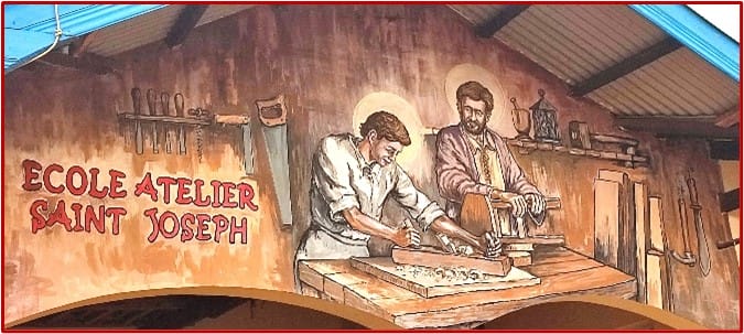 Mural of St. Joseph the carpenter teaching Jesus woodworking