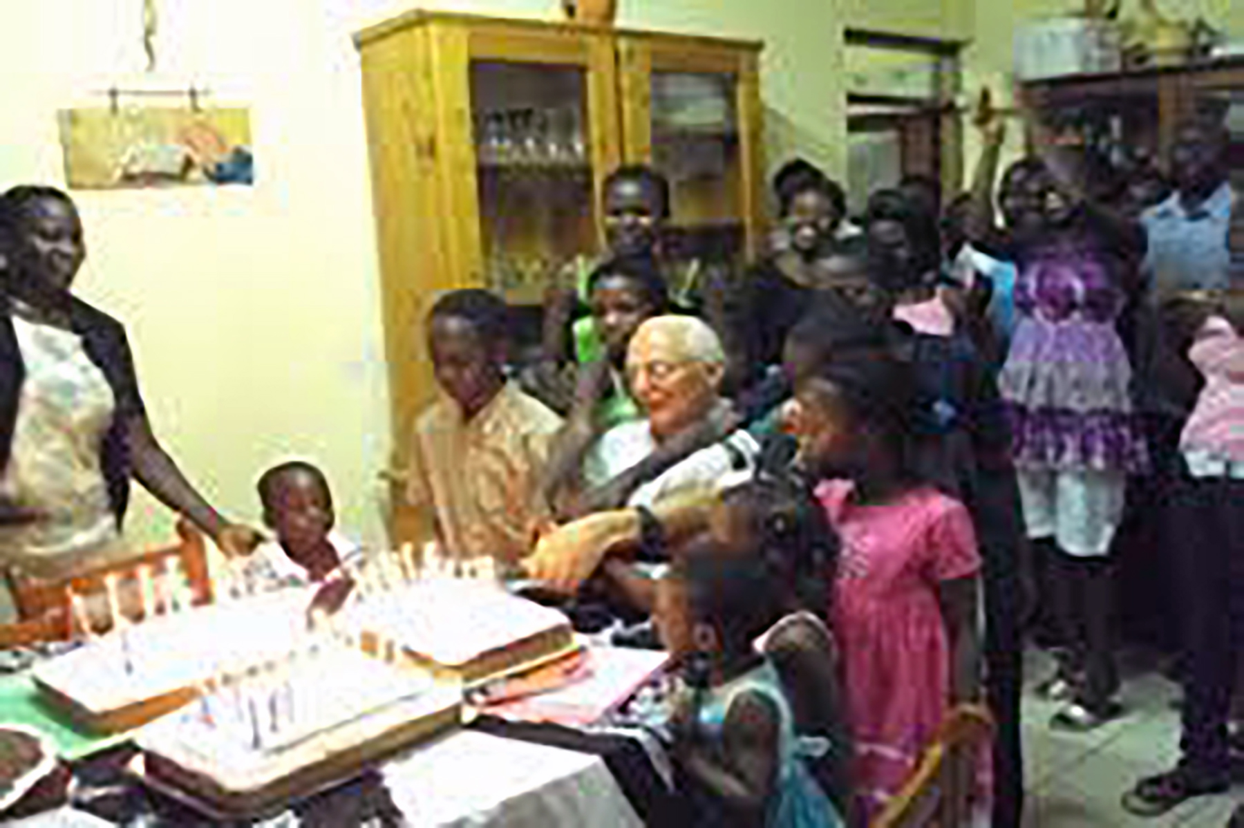 Then-Cardinal Robert Prevost stands with religious sisters and collaborators in Peru